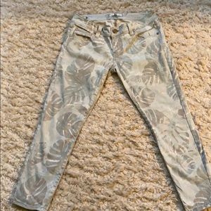 Size 4 Cabi cropped jeans in pale green.